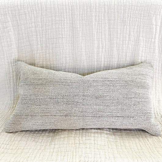 One of a kind and handmade just for Elle Jay, this pillow cover was made from a vintage Turkish kilim.  Fits up to 16x26 insert, measures 12x24. Cover only.